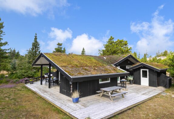 Einladendes Holzferienhaus mit 3 Terrassen und Sauna