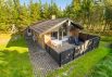 Lyst og hyggeligt sommerhus med sauna i ugenerede omgivelser (billede 1)
