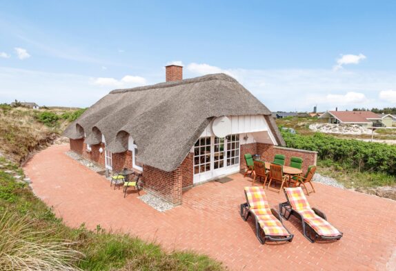 Gemütliches Ferienhaus mit Whirlpool, Infrarotsauna und grosser Terrasse auf einem geschützten Dünengrund